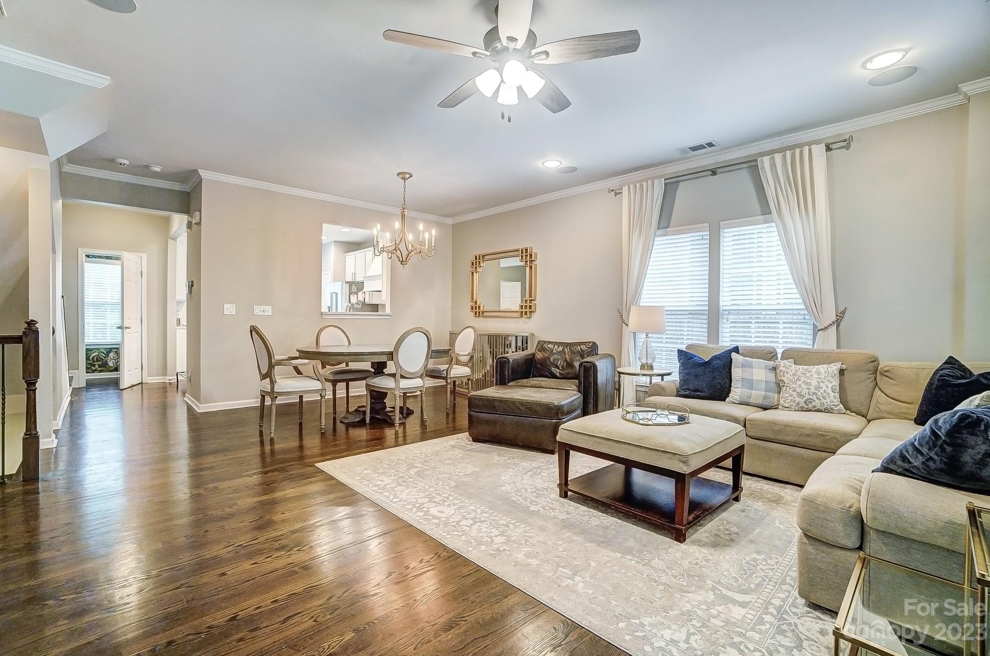 231 Lincoln Street Charlotte, NC 28203 - Photo 16 of 48 a living room with furniture and a large window