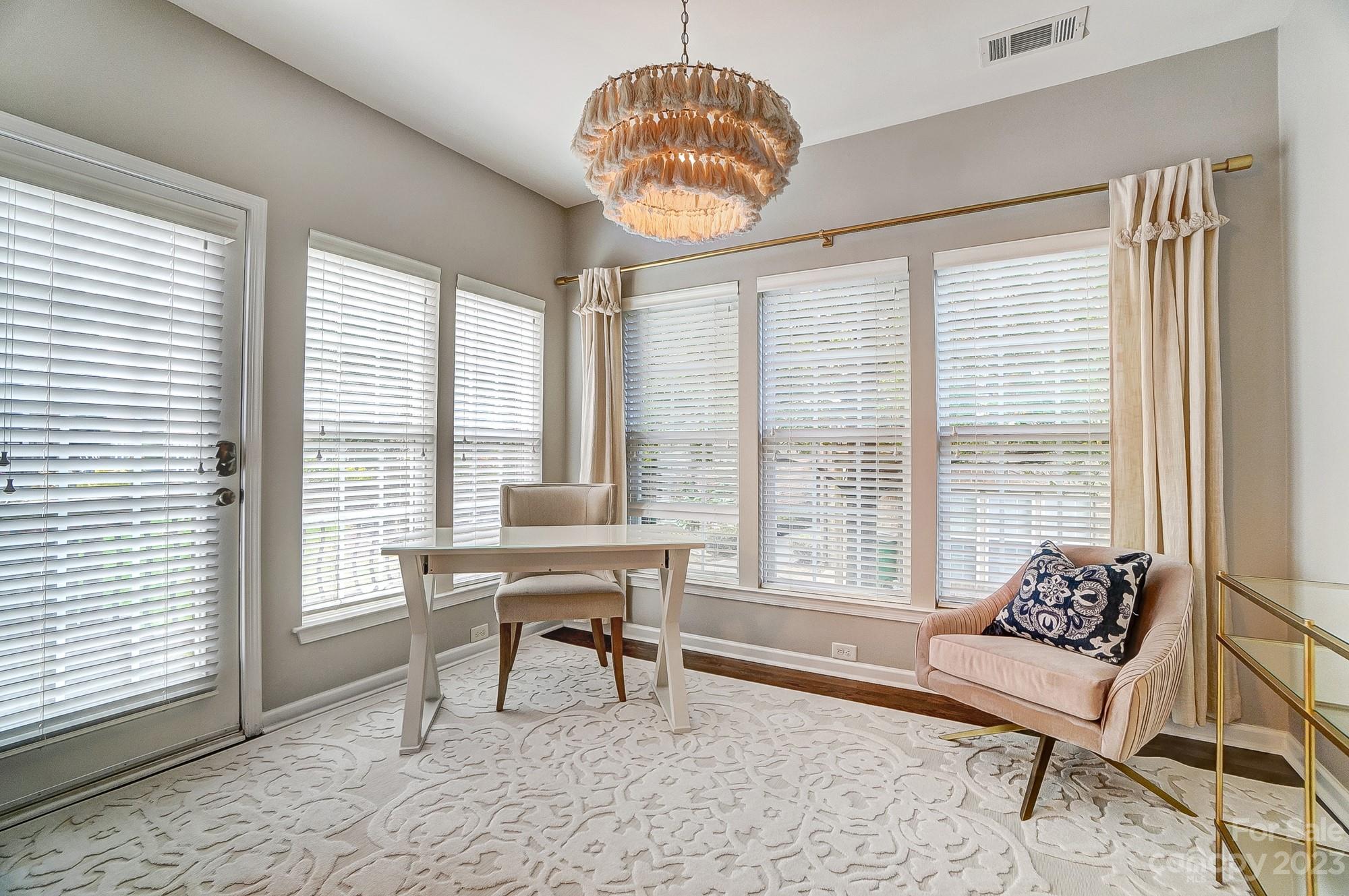 231 Lincoln Street Charlotte, NC 28203 - Photo 21 of 48 a living room with furniture and a large window