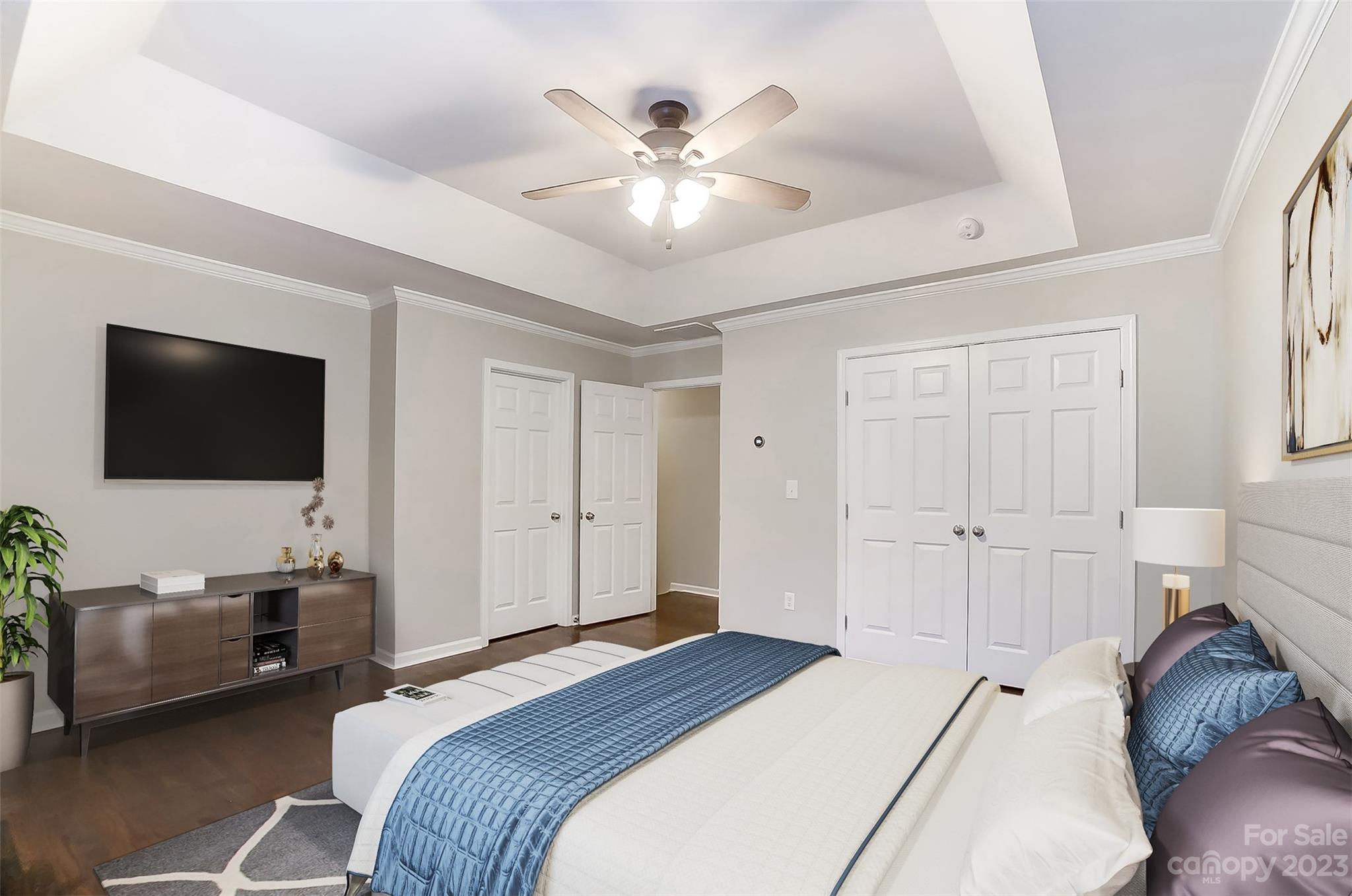 231 Lincoln Street Charlotte, NC 28203 - Photo 26 of 48 a bedroom with a bed window and a flat screen tv