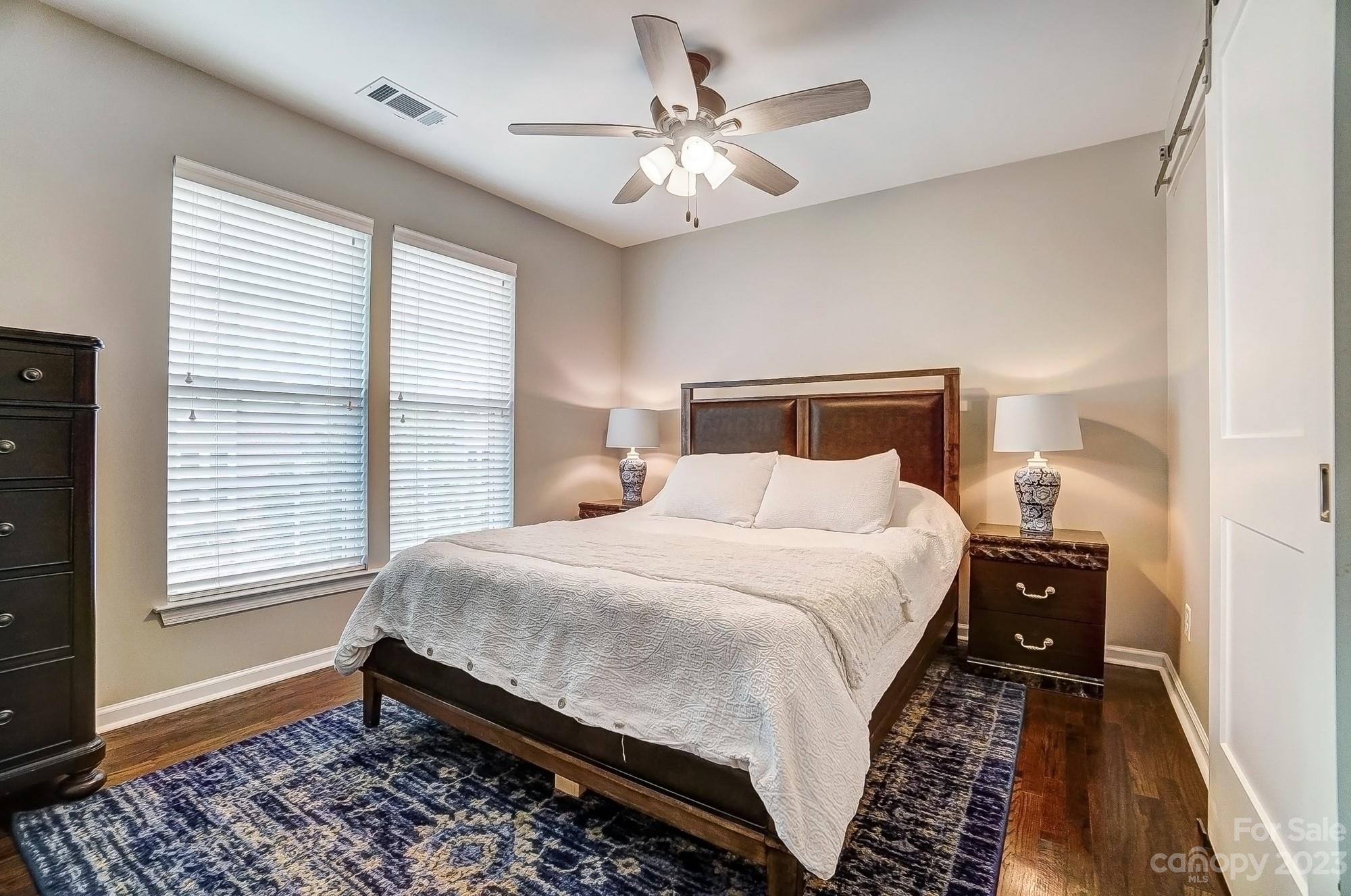 231 Lincoln Street Charlotte, NC 28203 - Photo 31 of 48 a bedroom with a bed and a window