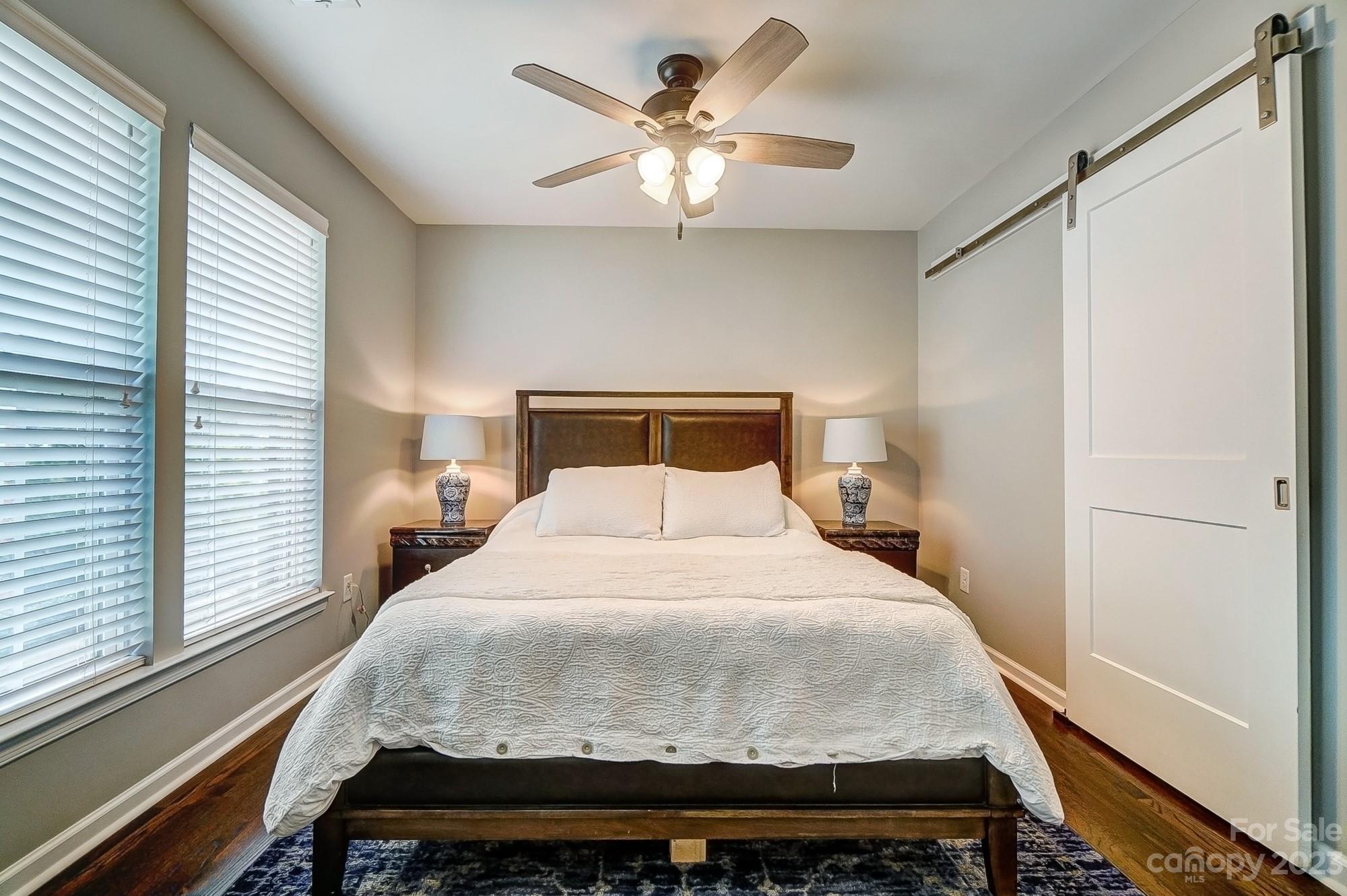 231 Lincoln Street Charlotte, NC 28203 - Photo 32 of 48 a bedroom with a bed and window