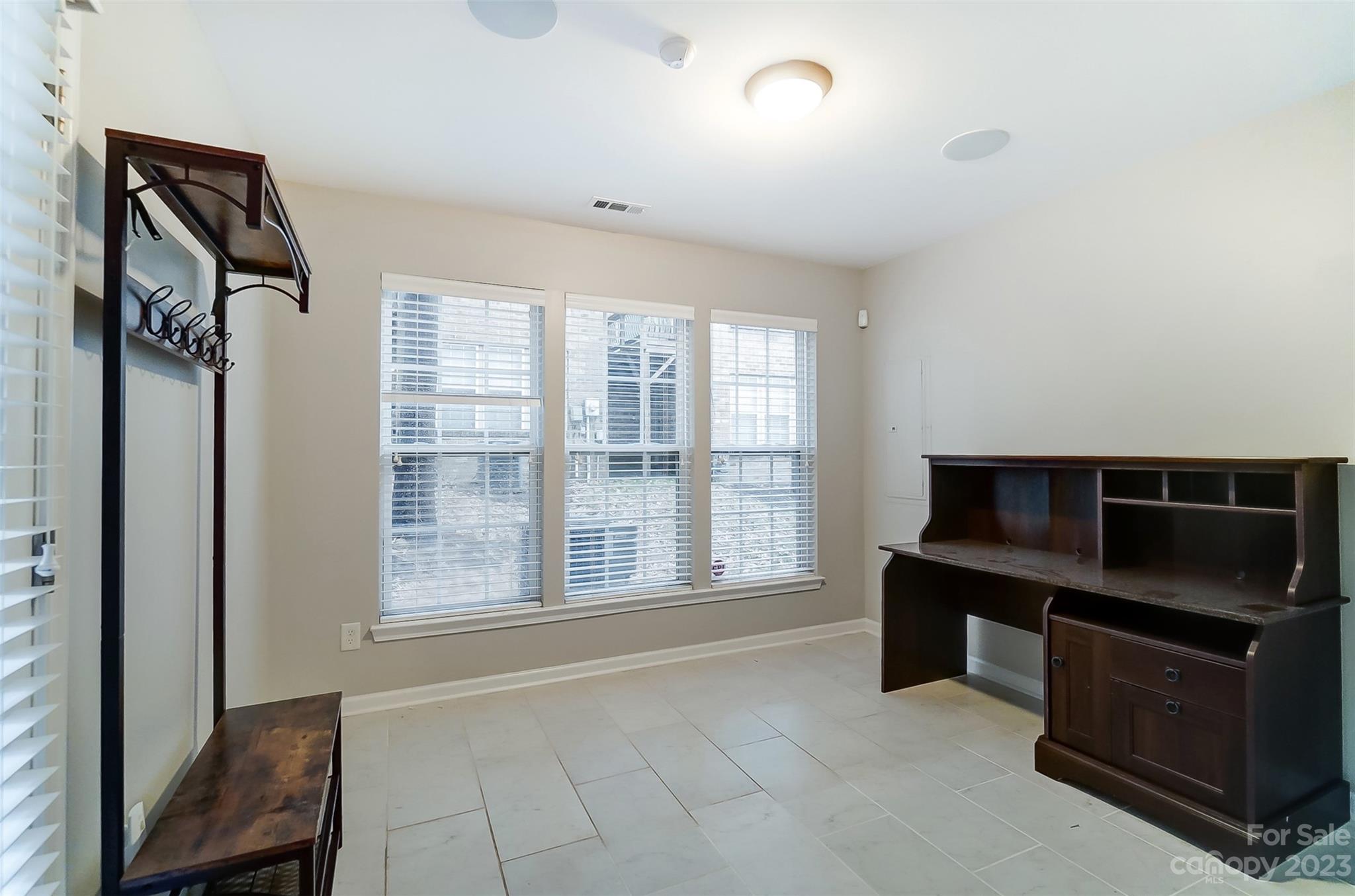 231 Lincoln Street Charlotte, NC 28203 - Photo 45 of 48 a view of room with furniture and windows