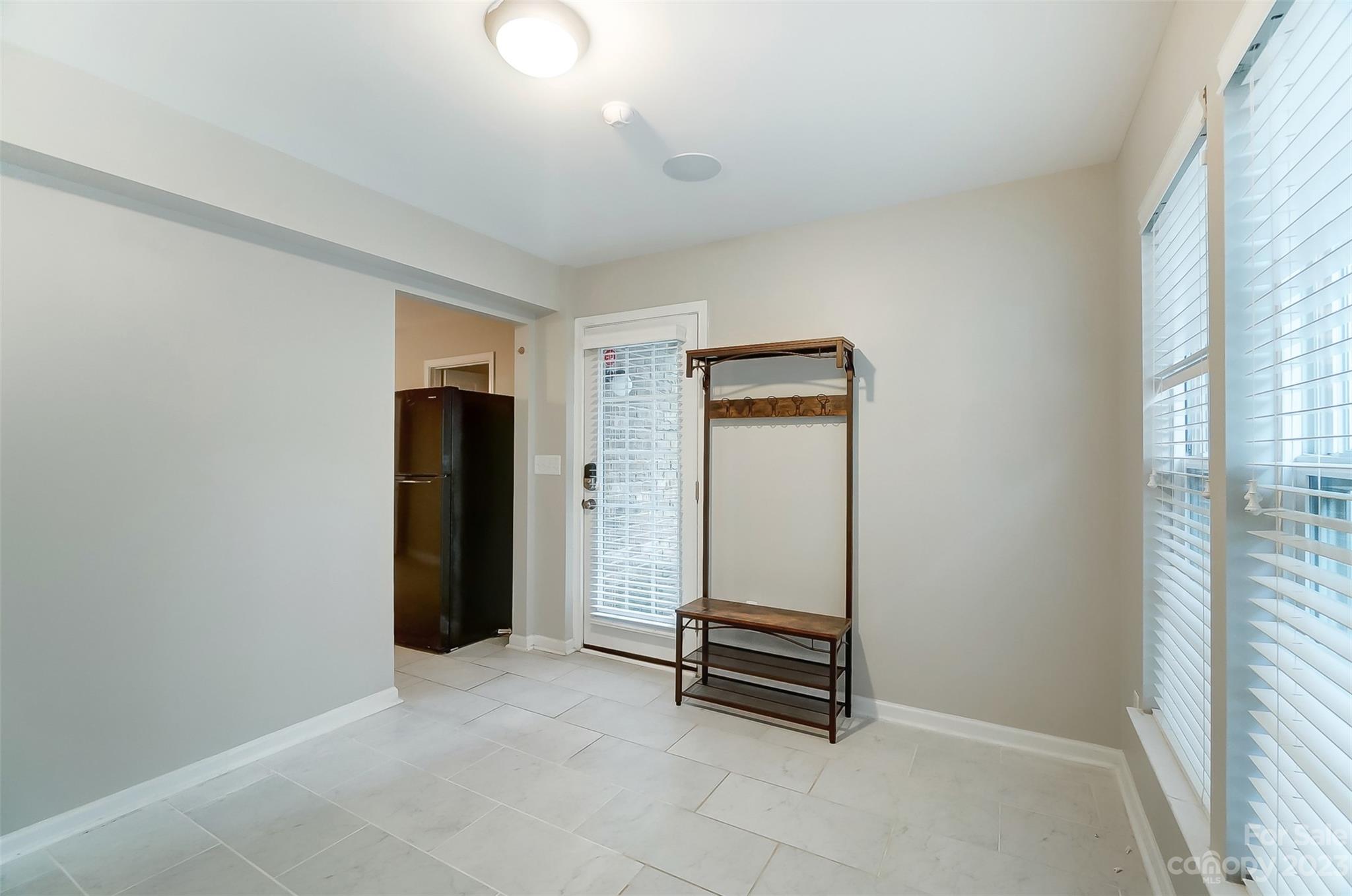 231 Lincoln Street Charlotte, NC 28203 - Photo 46 of 48 an empty room with windows