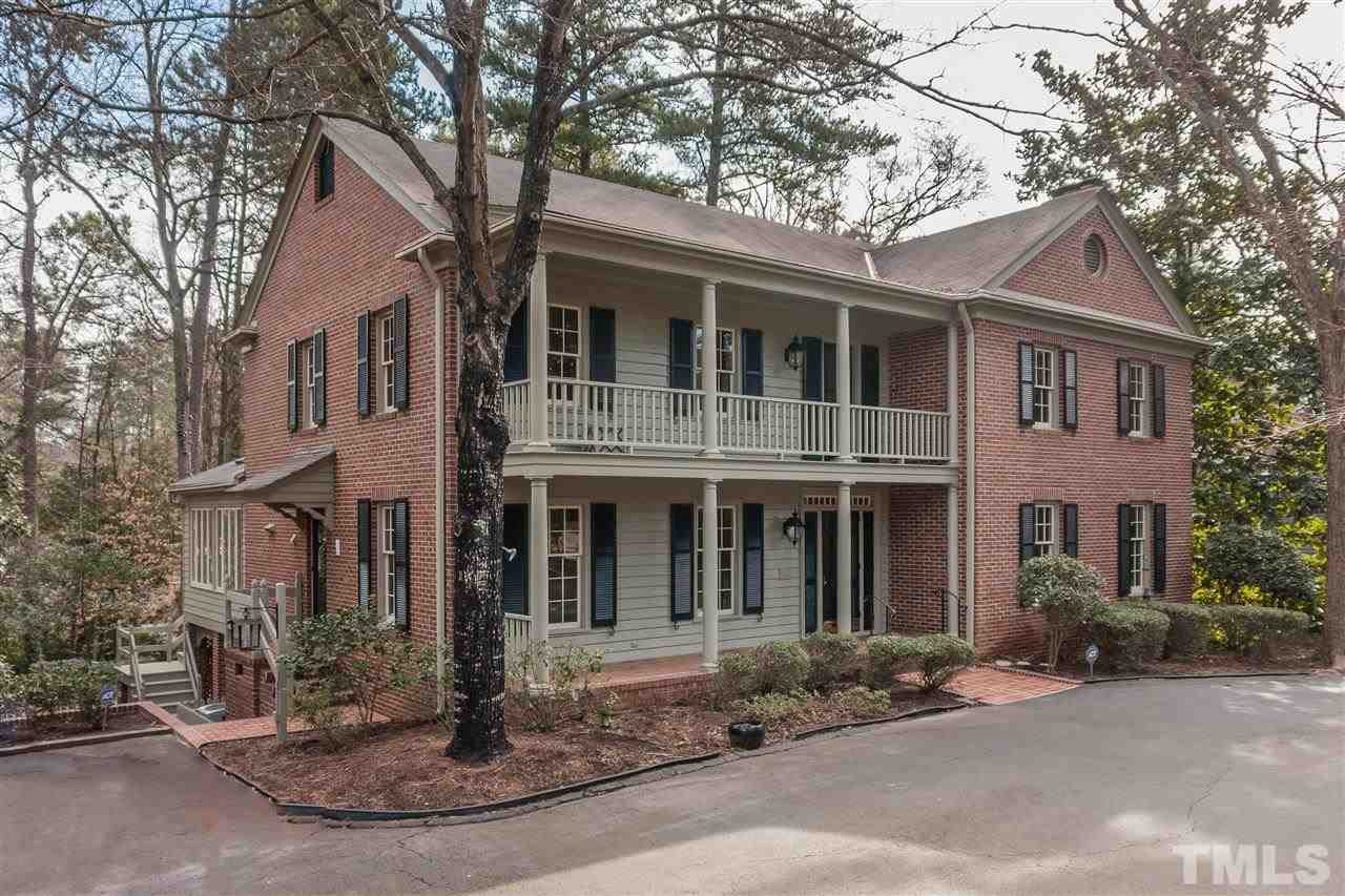 3400 Landor Road Raleigh, NC 27609 - Photo 1 of 25 a front view of a house with a yard and garage
