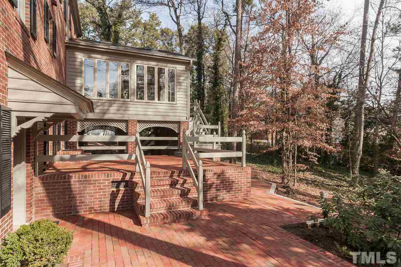 3400 Landor Road Raleigh, NC 27609 - Photo 23 of 25 a view of a chairs and table on the wooden roof
