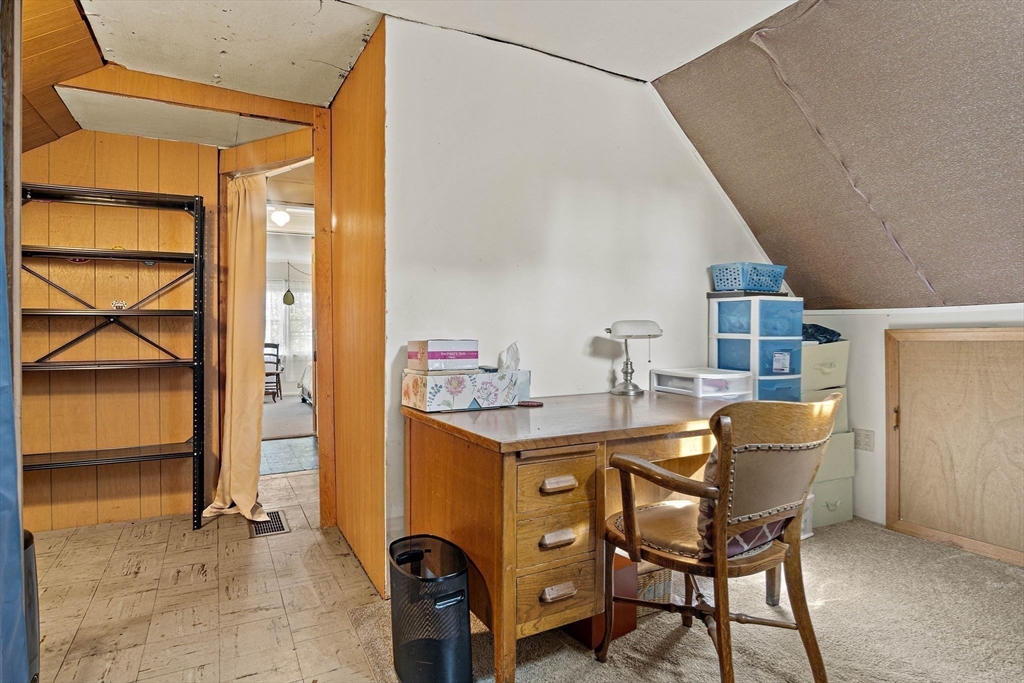 21 Kelsey Road Natick, MA 01760 - Photo 24 of 34 a dining room with a table and chairs