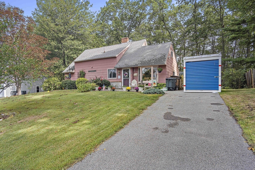 21 Kelsey Road Natick, MA 01760 - Photo 28 of 34 a view of a house with a big yard and large trees