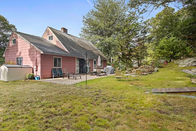 a house view with a garden space