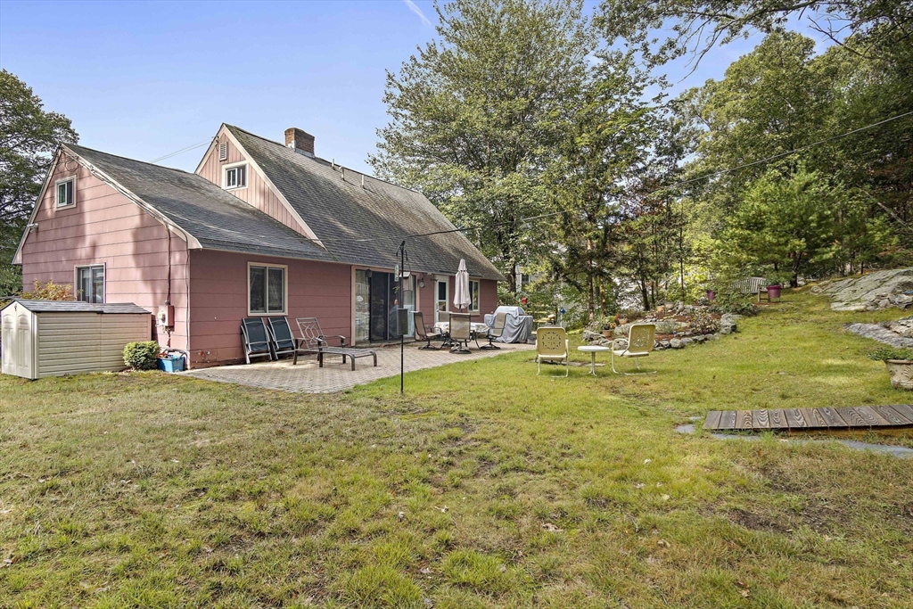 21 Kelsey Road Natick, MA 01760 - Photo 29 of 34 a front view of house with yard and trees