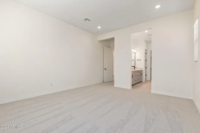 a view of a livingroom with a refrigerator