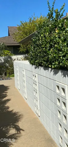 a view of a wooden door and an outdoor space