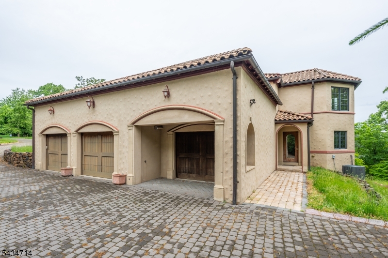 50 Rock Spring Road West Orange, NJ 07052 - Photo 6 of 50 a front view of a house with a yard