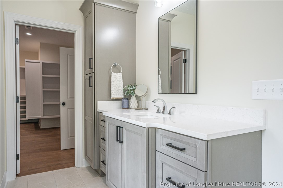 113 Pittman Road West End, NC 27376 - Photo 21 of 50 a bathroom with a sink and a mirror
