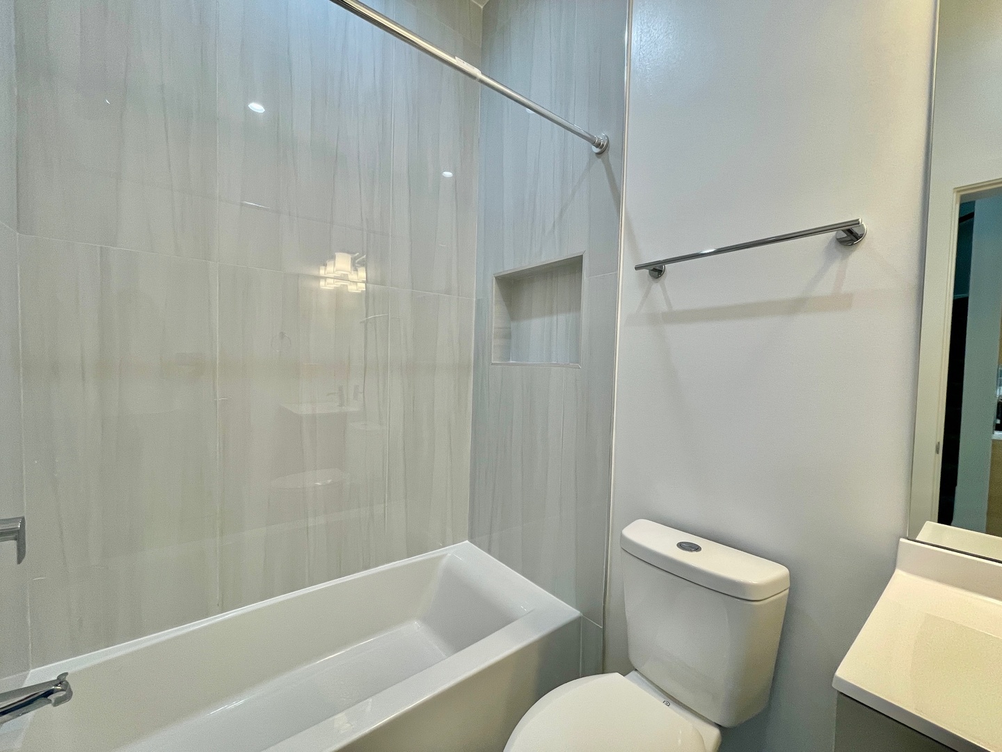 2238 West 24th Street, Unit 2F Chicago, IL 60608 - Photo 15 of 25 a bathroom with a toilet and a shower