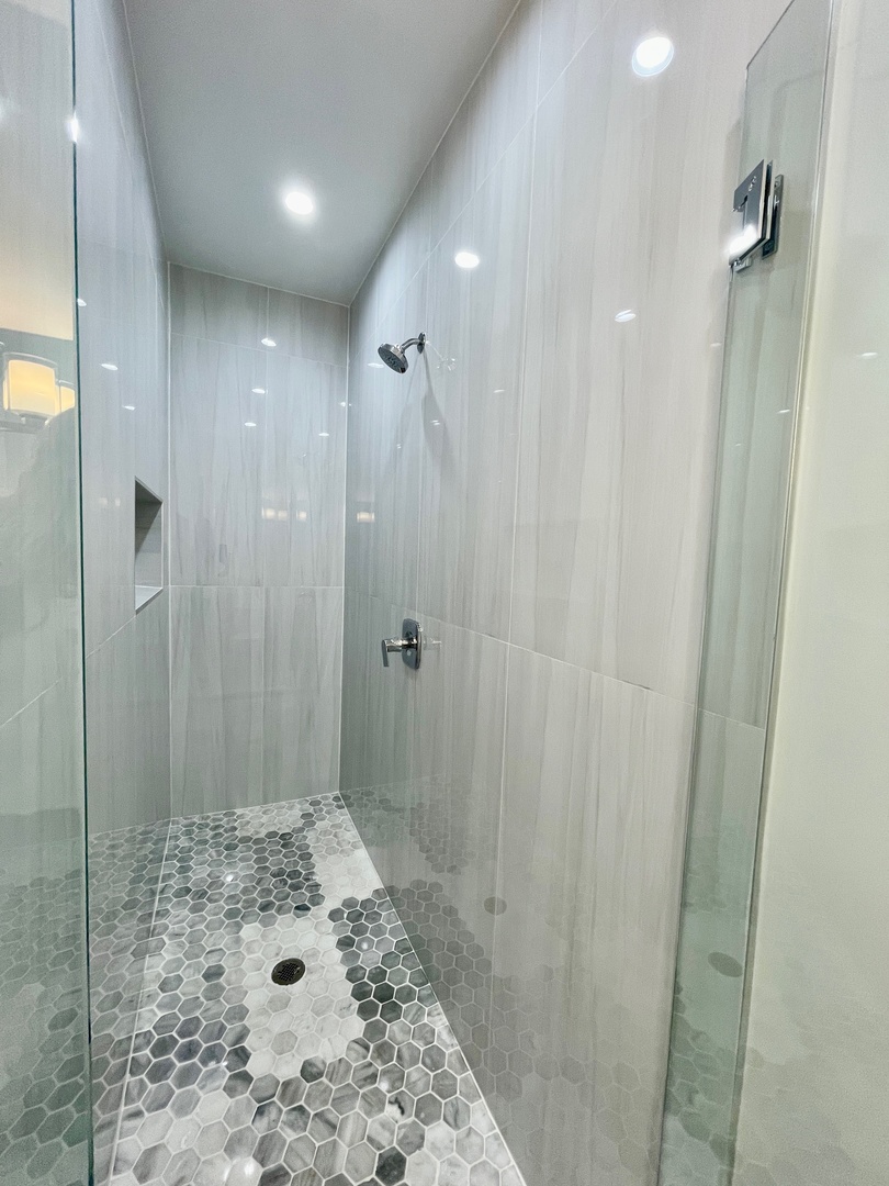 2238 West 24th Street, Unit 2F Chicago, IL 60608 - Photo 22 of 25 a bathroom with a shower and a sink