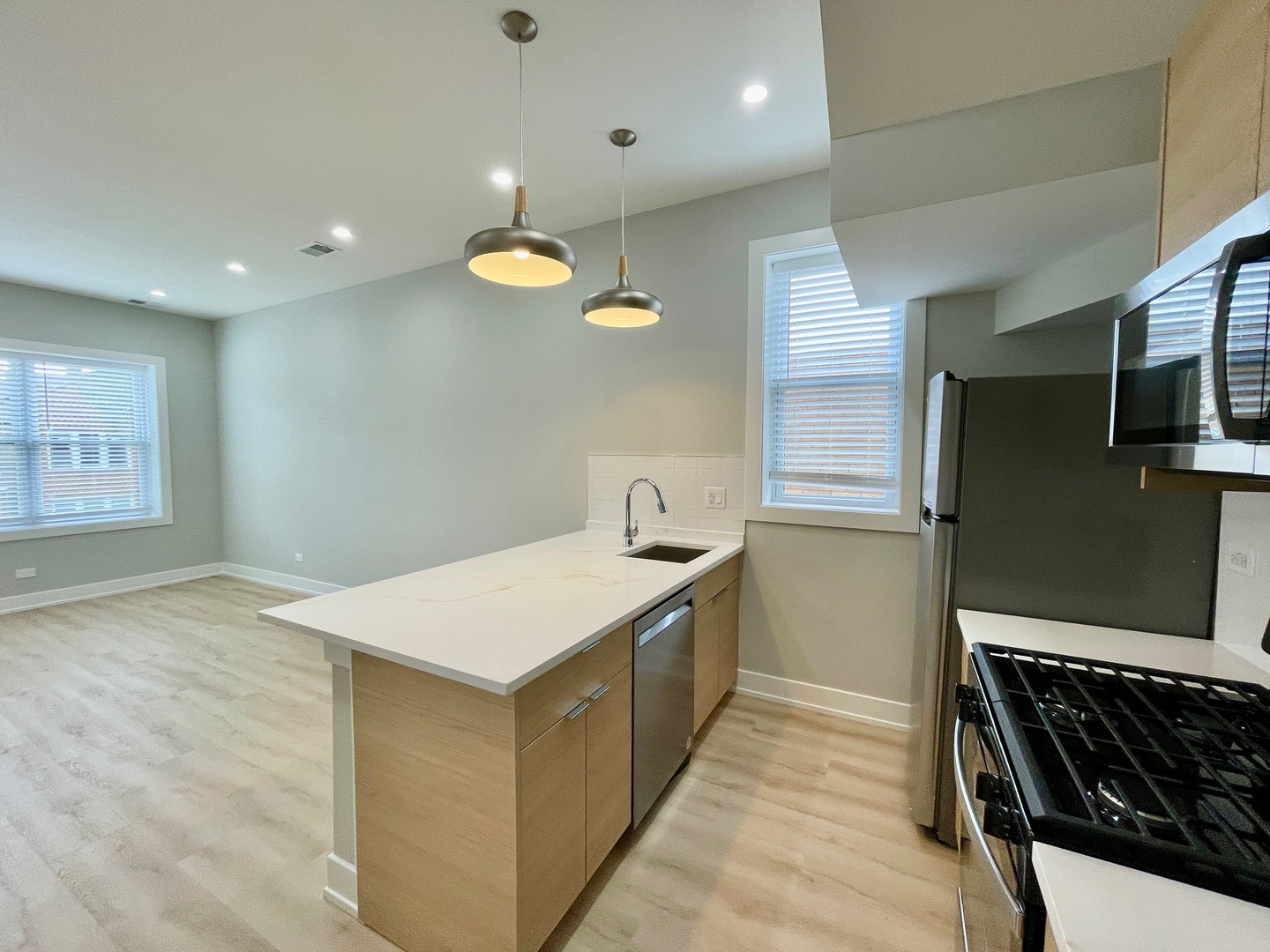 2238 West 24th Street, Unit 2F Chicago, IL 60608 - Photo 9 of 25 a kitchen that has a lot of cabinets in it