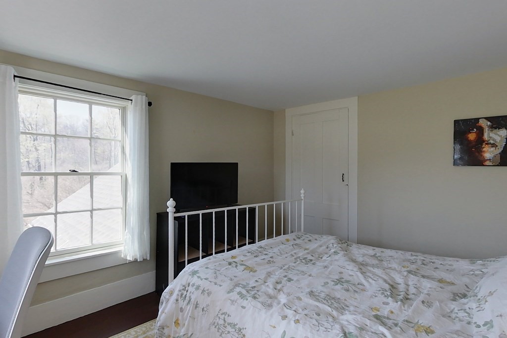 95 South Road Ashby, MA 01431 - Photo 16 of 33 a bedroom with a bed and a window