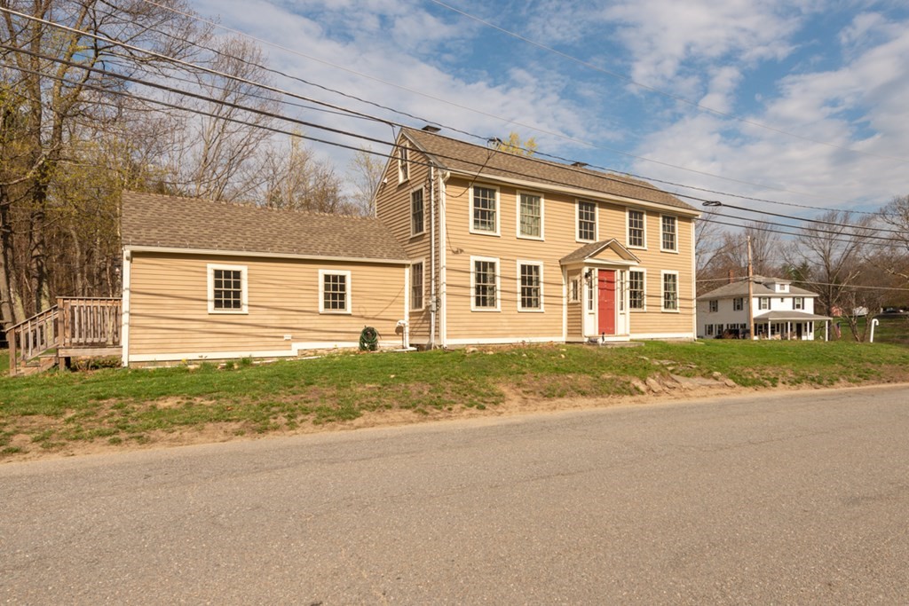 95 South Road Ashby, MA 01431 - Photo 21 of 33 front view of a house with a street