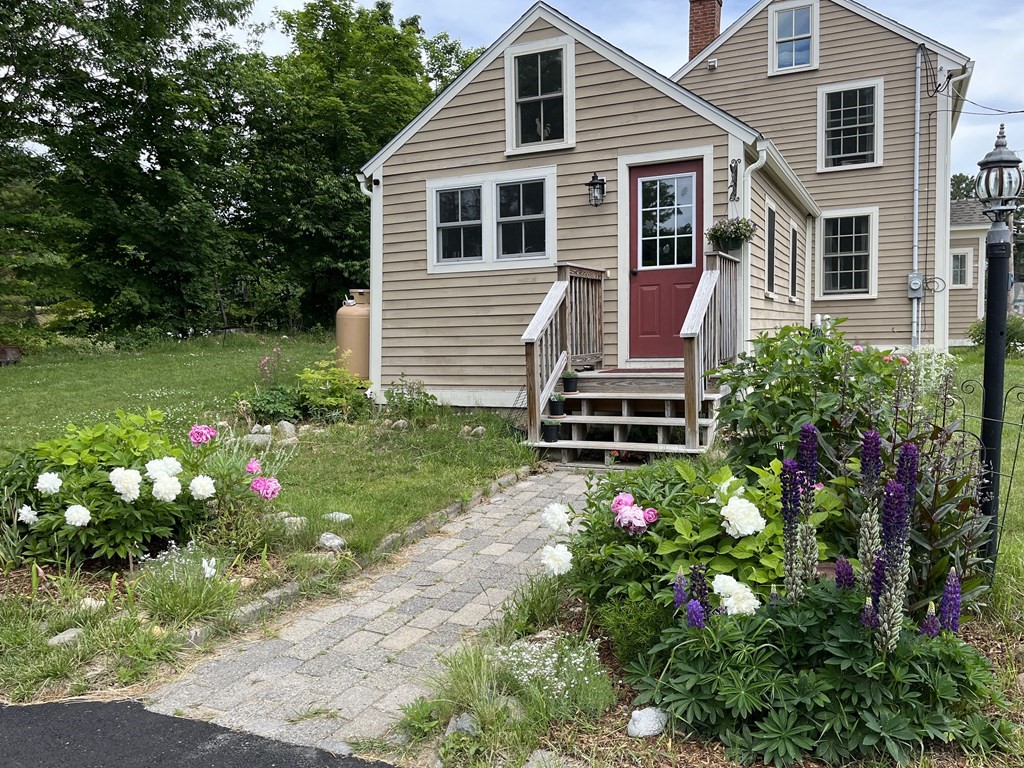95 South Road Ashby, MA 01431 - Photo 25 of 33 a view of a house with a yard and garden