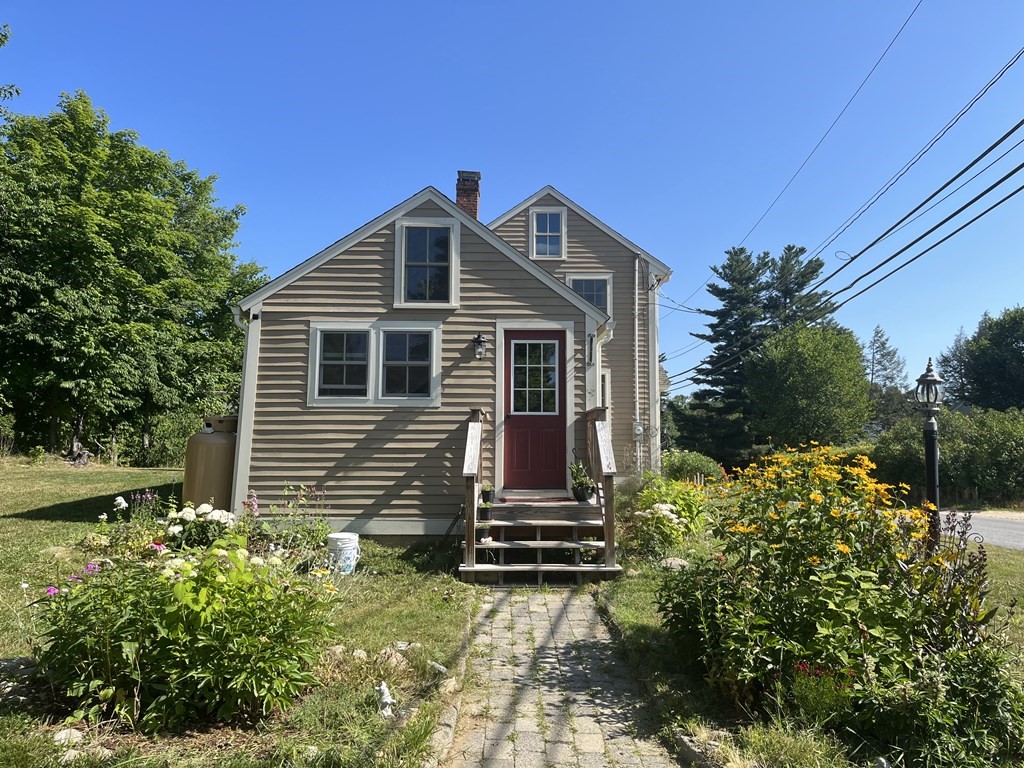 95 South Road Ashby, MA 01431 - Photo 26 of 33 a front view of a house with a yard
