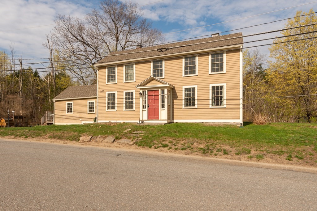 95 South Road Ashby, MA 01431 - Photo 30 of 33 a front view of a house with a garden