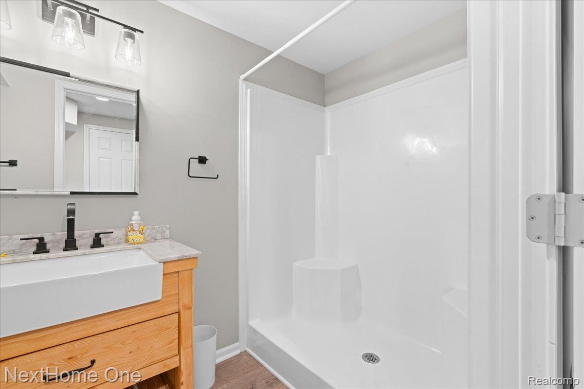10083 Ridge Run Street, Unit 24 Howell, MI 48855 - Photo 19 of 27 Basement bathroom with full shower