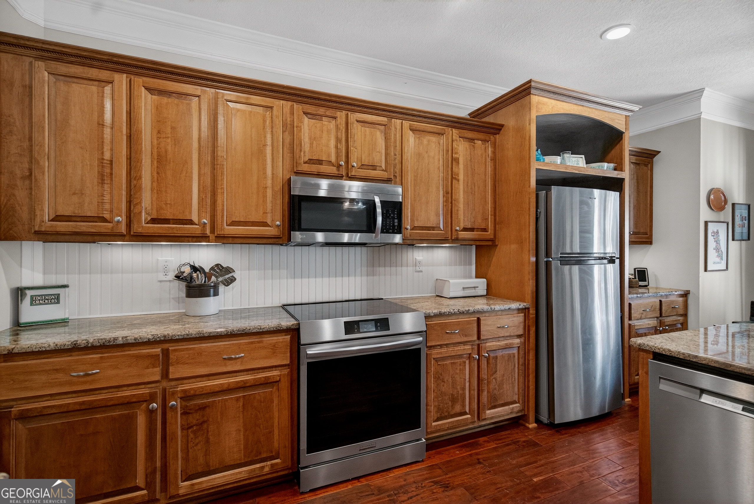 830 John Lovelace Road LaGrange, GA 30241 - Photo 19 of 44 a kitchen with stainless steel appliances granite countertop a refrigerator stove and sink