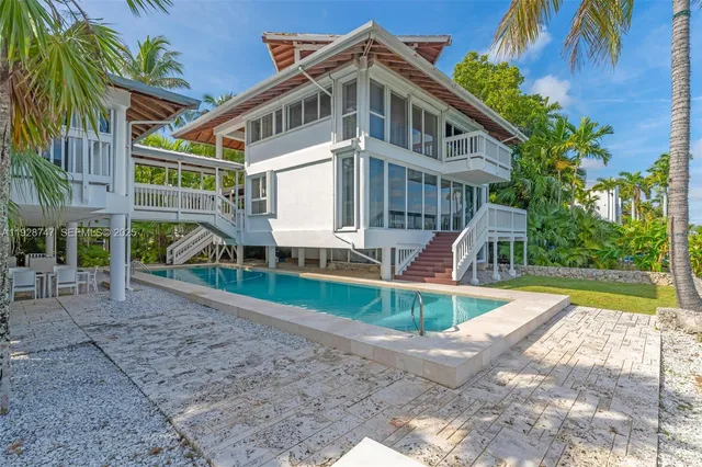 a view of a house with porch and wooden floor