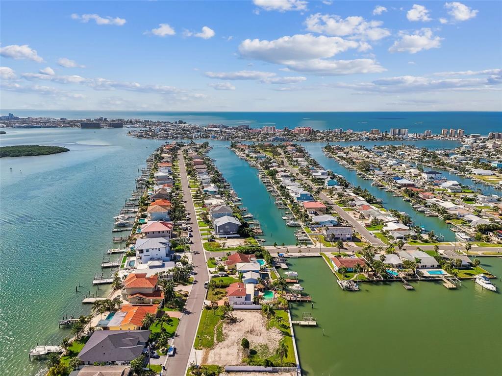 568 Johns Pass Avenue Madeira Beach, FL 33708 - Photo 24 of 36 an aerial view of city and lake