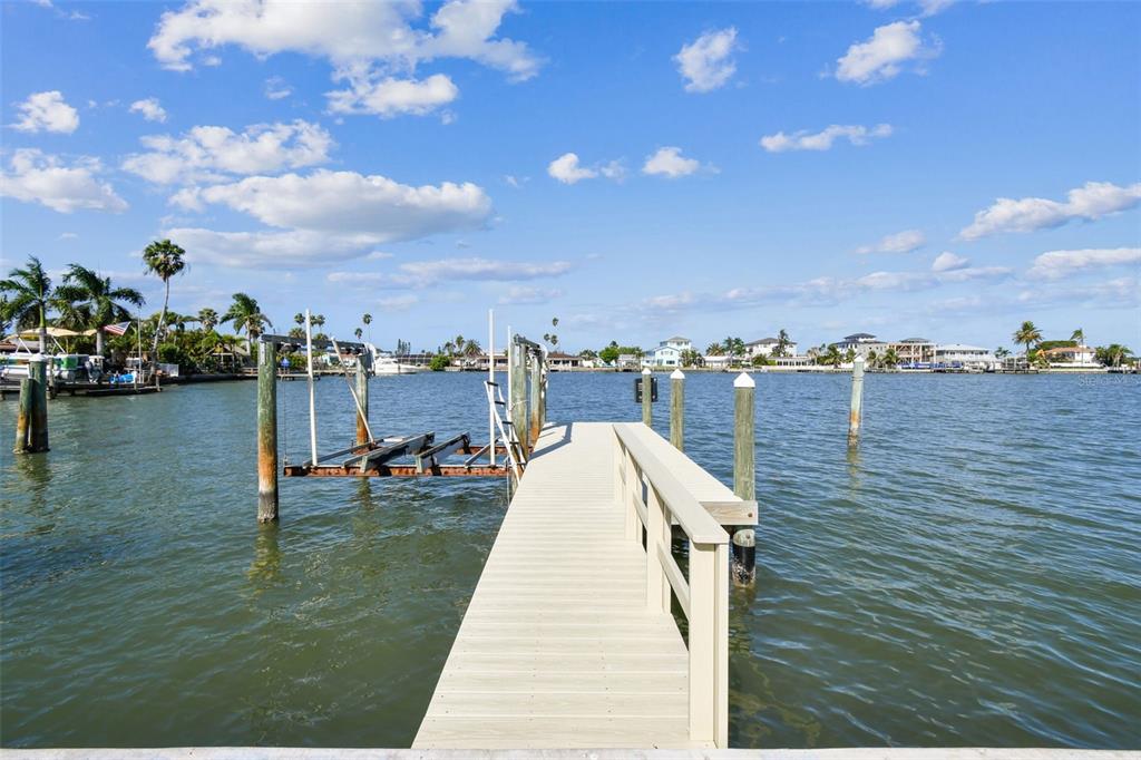 568 Johns Pass Avenue Madeira Beach, FL 33708 - Photo 34 of 36 a view of a lake with city