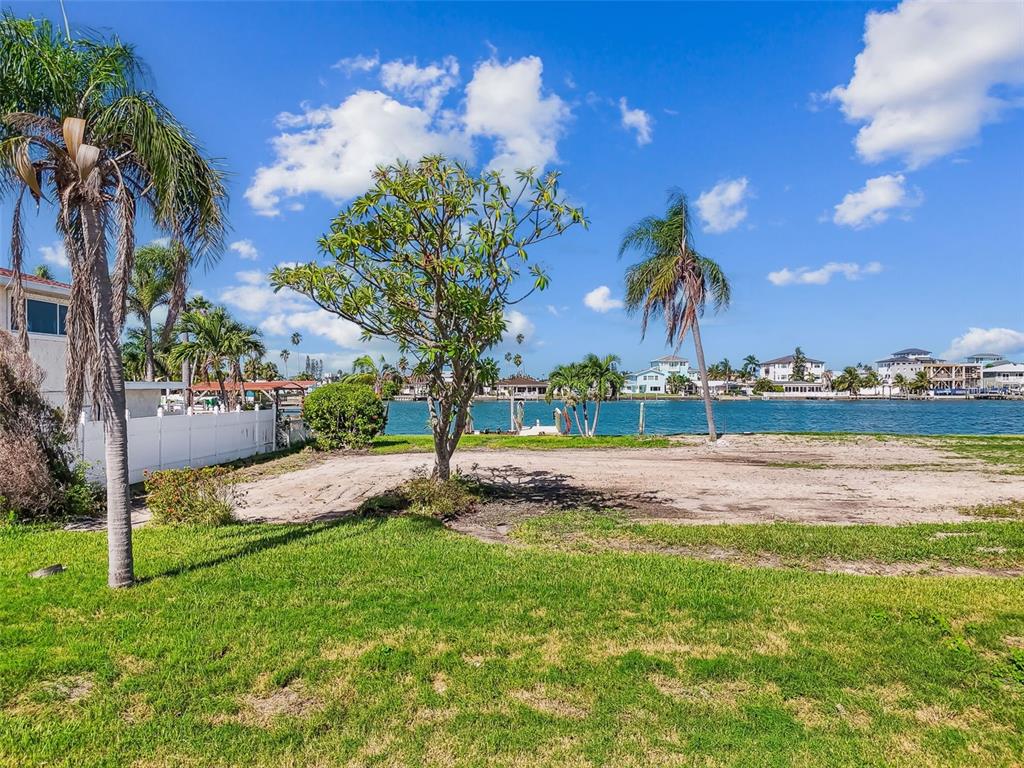 568 Johns Pass Avenue Madeira Beach, FL 33708 - Photo 8 of 36 a view of a yard and entertaining space