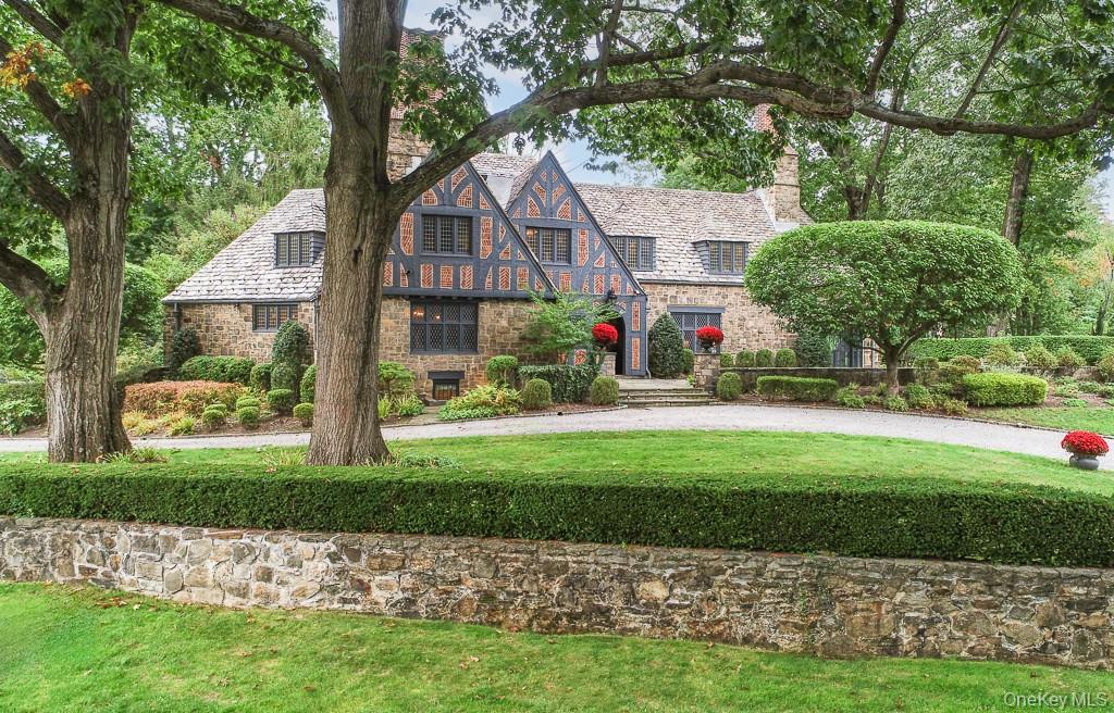 21 Hampshire Road Bronxville, NY 10708 - Photo 40 of 41 a front view of a house with a yard