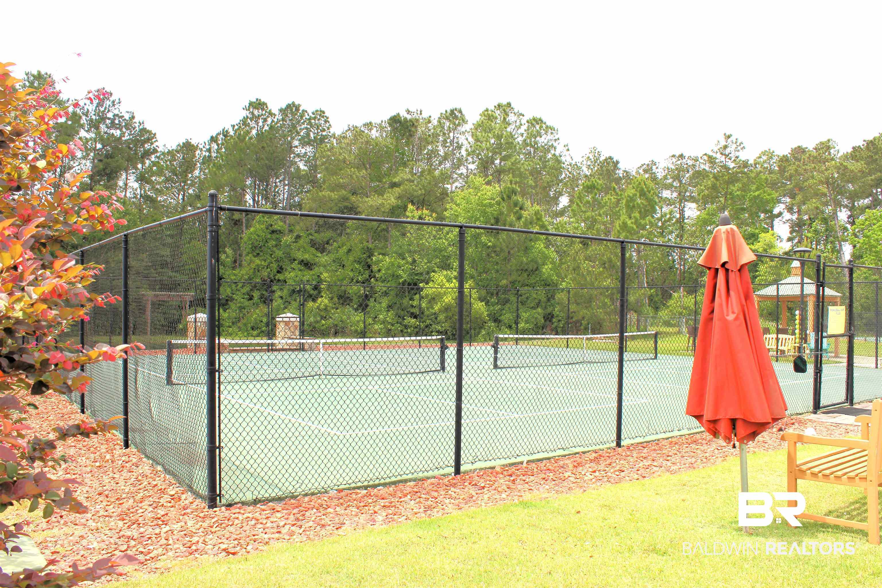 11869 Gateway Drive Elberta, AL 36530 - Photo 51 of 78 View of pickleball courts featuring fence