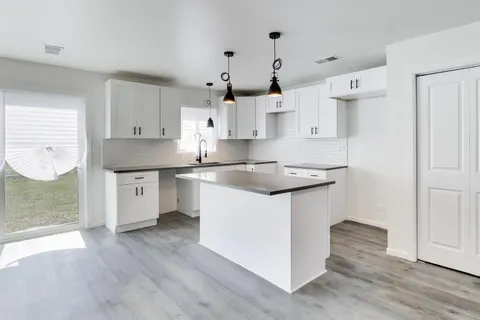 $249,000 | 142 West 156th Place, Harvey, IL 60426