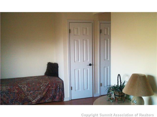 110 Evergreen Road, Unit 202 Dillon, CO 80435 - Photo 7 of 10 a living room with a couch and a potted plant