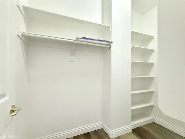 a view of an empty walk in closet