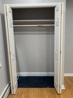 1503 76th Street, Unit 2 North Bergen, NJ 07047 - Photo 9 of 11 a view of walk in closet with clothes