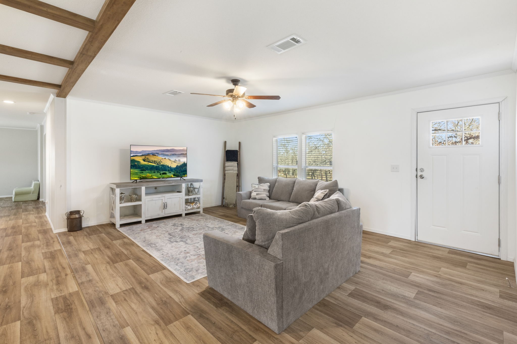 101 Hill Loop Road Somerville, TX 77879 - Photo 14 of 45 a living room with furniture and a wooden floor