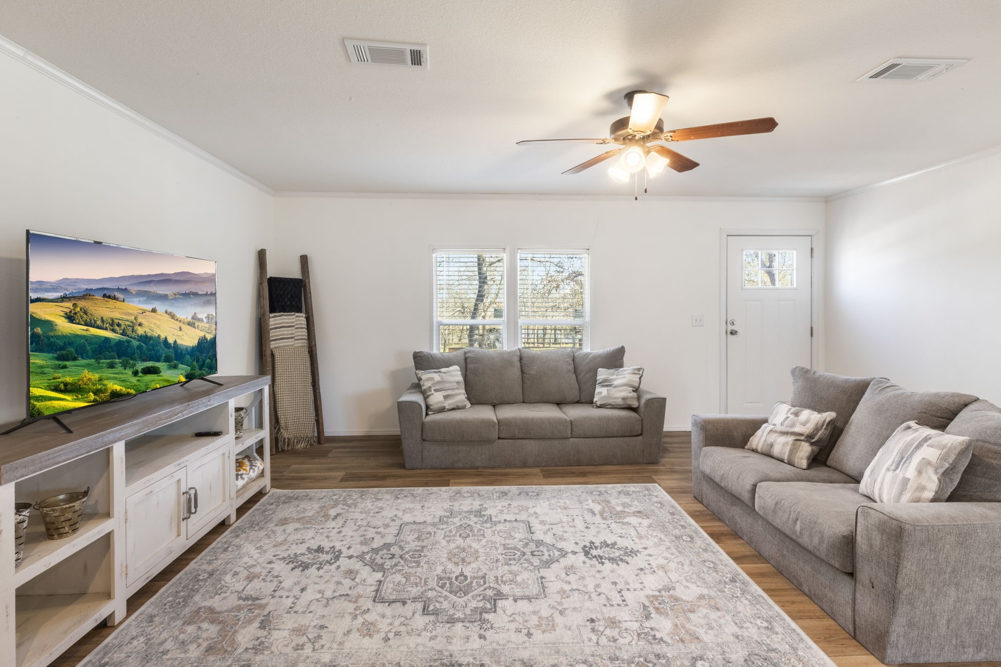 101 Hill Loop Road Somerville, TX 77879 - Photo 15 of 45 a living room with furniture and a flat screen tv