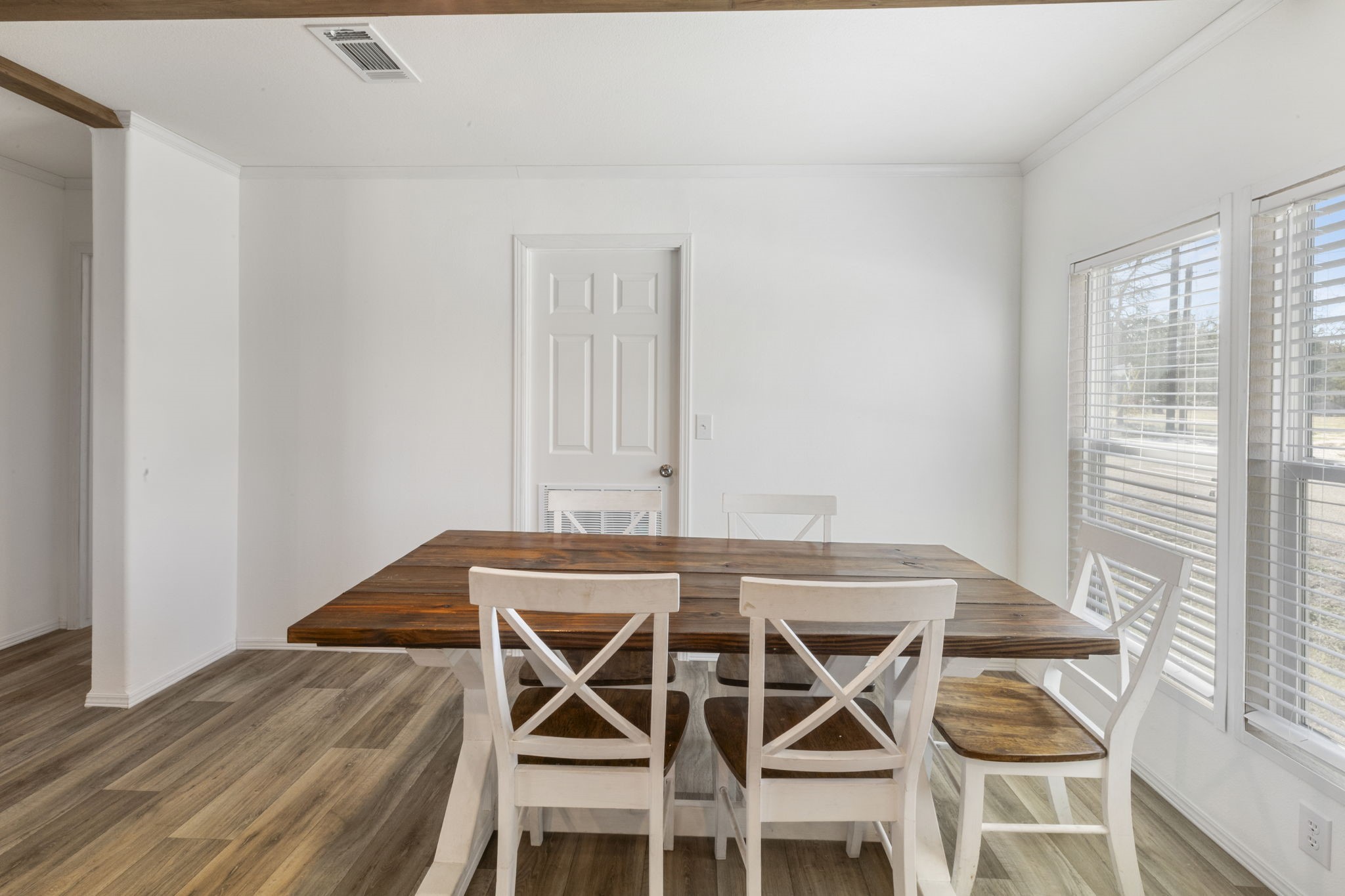 101 Hill Loop Road Somerville, TX 77879 - Photo 26 of 45 a view of a dining room with furniture and wooden floor
