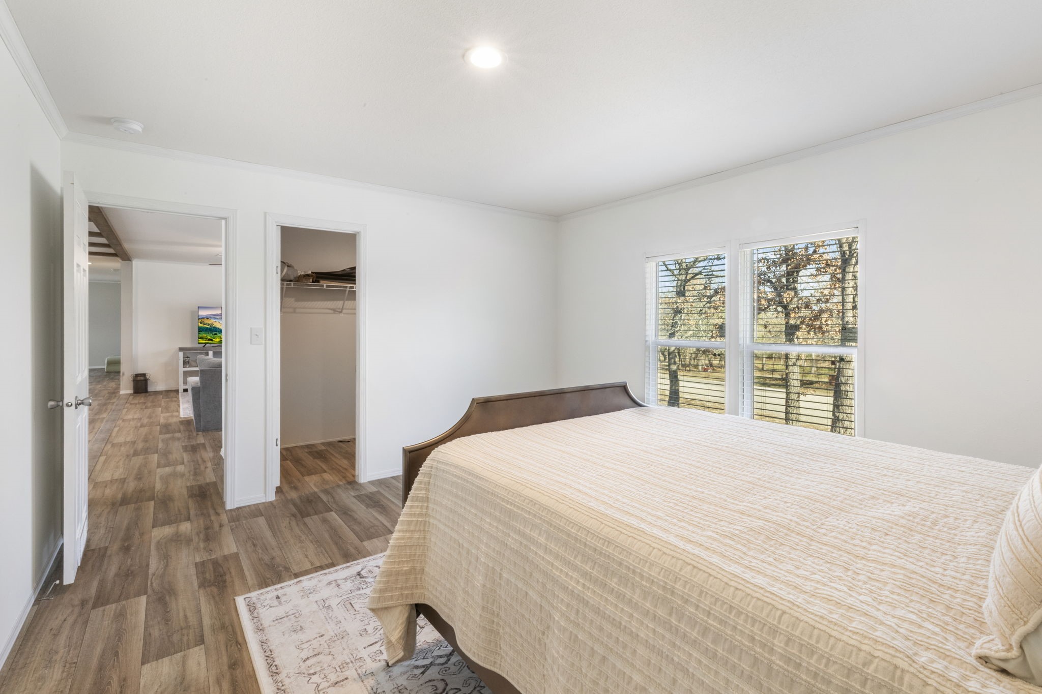 101 Hill Loop Road Somerville, TX 77879 - Photo 30 of 45 a bedroom with a bed and a large window