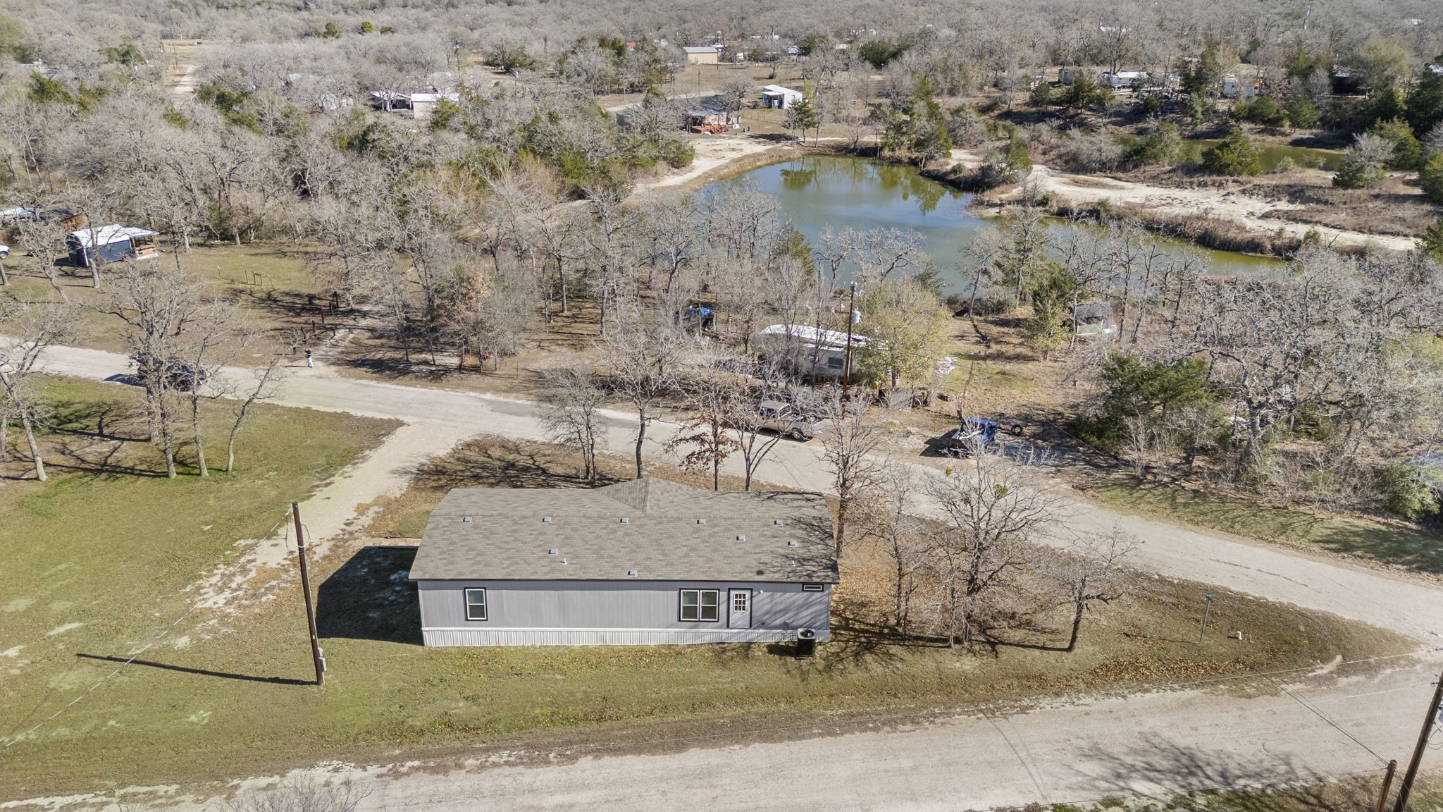 101 Hill Loop Road Somerville, TX 77879 - Photo 3 of 45 an aerial view of residential houses with outdoor space