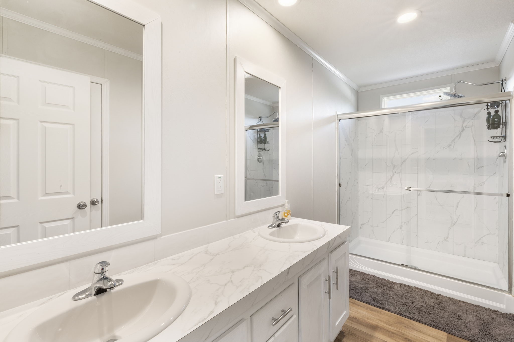 101 Hill Loop Road Somerville, TX 77879 - Photo 31 of 45 a bathroom with a granite countertop sink mirror and a