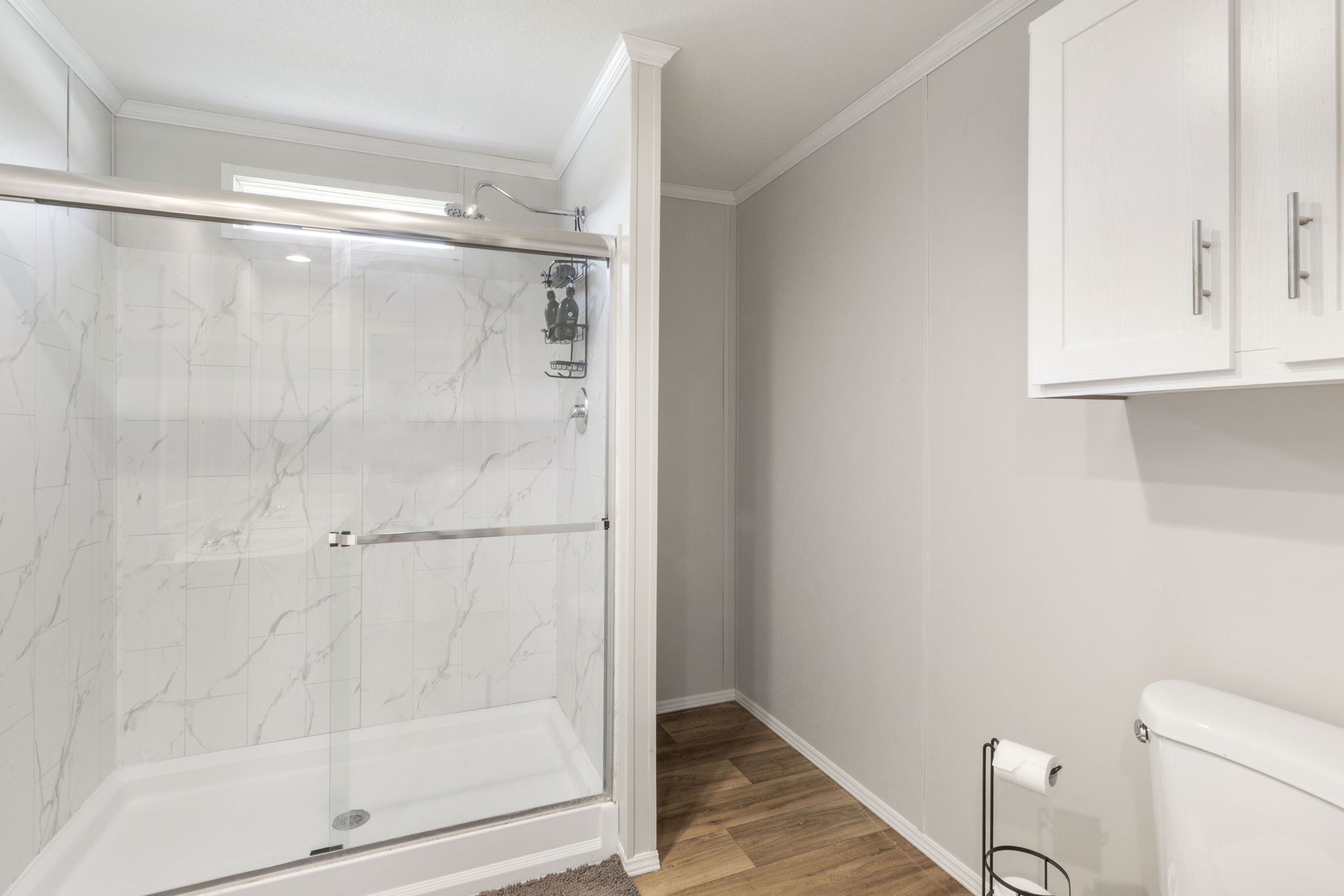 101 Hill Loop Road Somerville, TX 77879 - Photo 32 of 45 a bathroom with a glass shower door