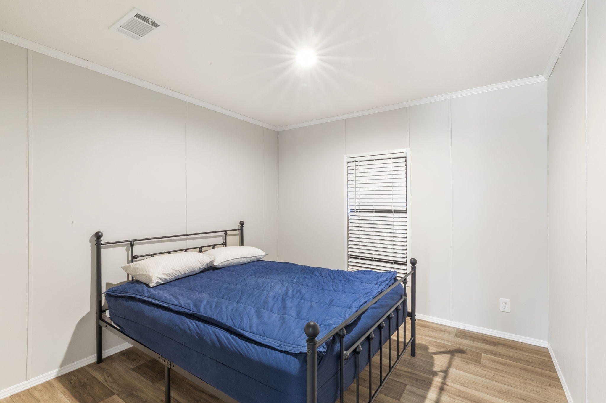 101 Hill Loop Road Somerville, TX 77879 - Photo 35 of 45 a room with a bed and a window