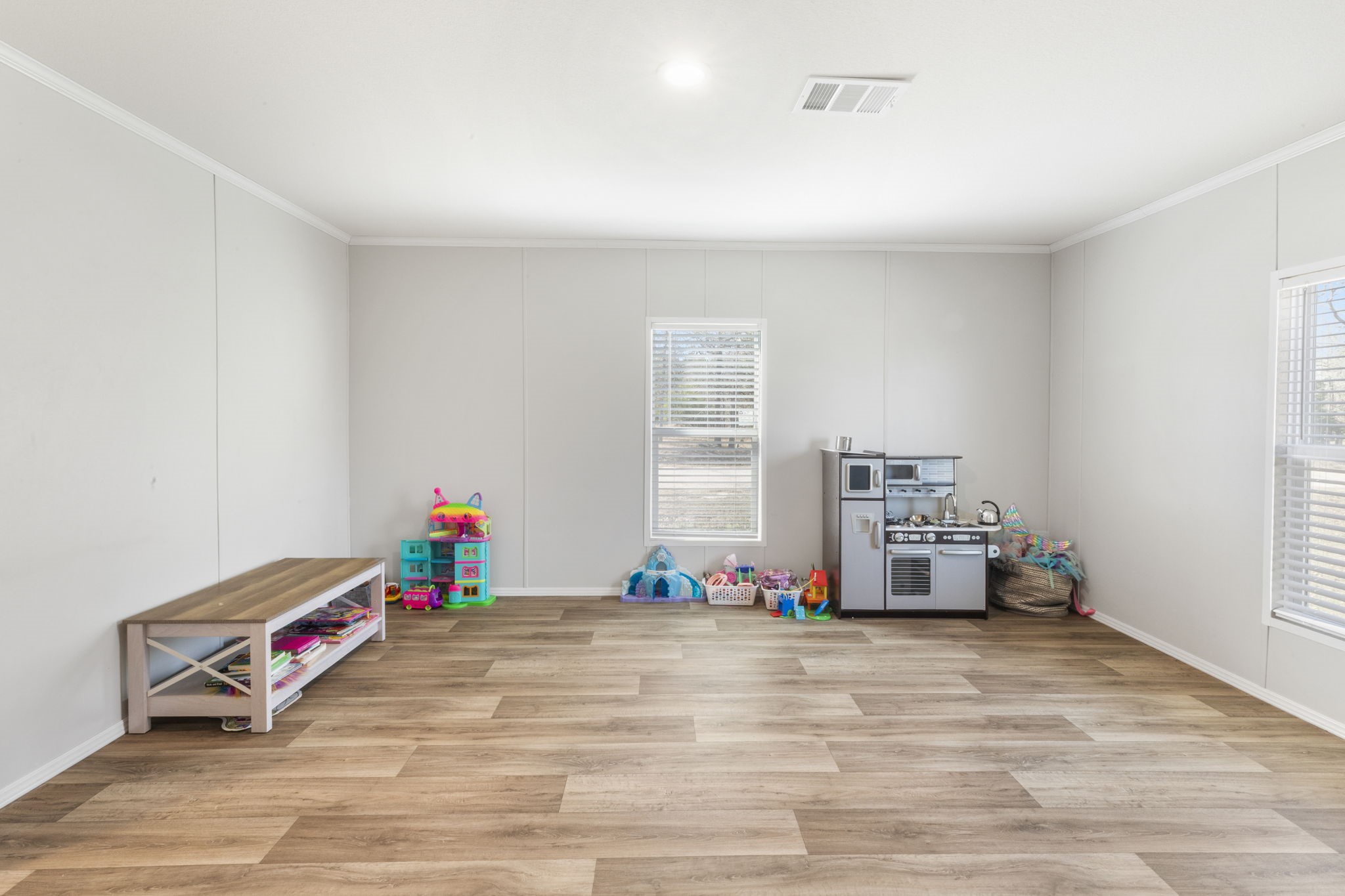 101 Hill Loop Road Somerville, TX 77879 - Photo 38 of 45 a living room with furniture and a flat screen tv