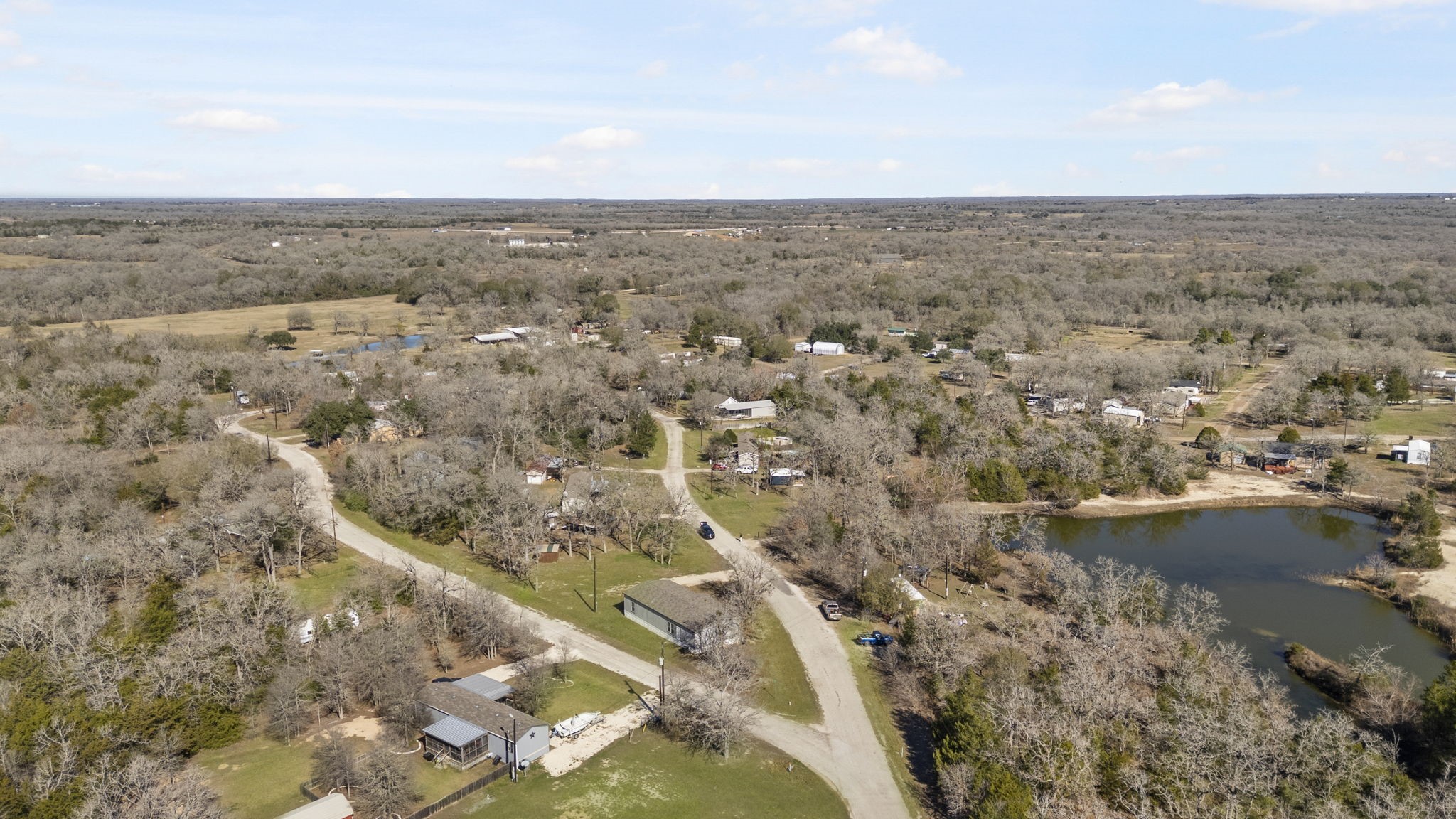 101 Hill Loop Road Somerville, TX 77879 - Photo 9 of 45 an aerial view of residential houses with outdoor space