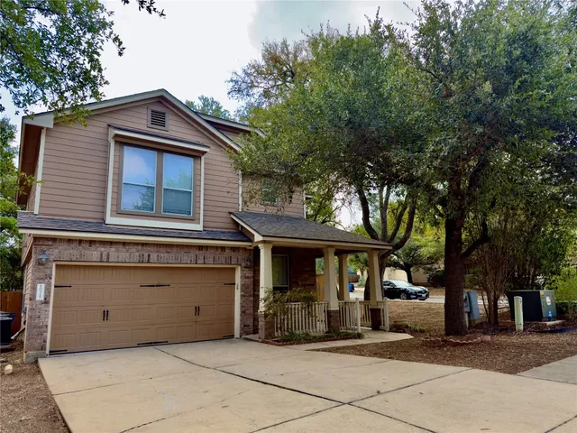 a view of a house with a garage