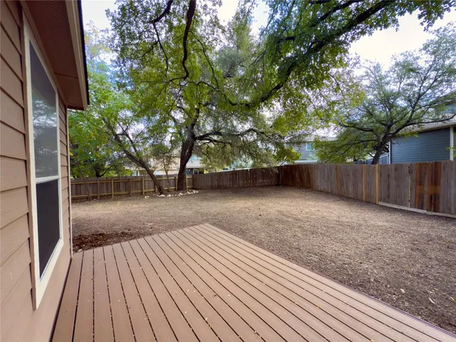 a view of backyard with wooden floor
