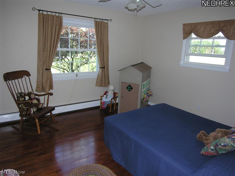 10267 Murray Ridge Road Elyria, OH 44035 - Photo 13 of 25 All bedrooms have wood floors. Two windows for good ventilation.